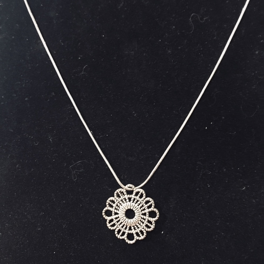 Silver Pendant with “16 inch silver chain.